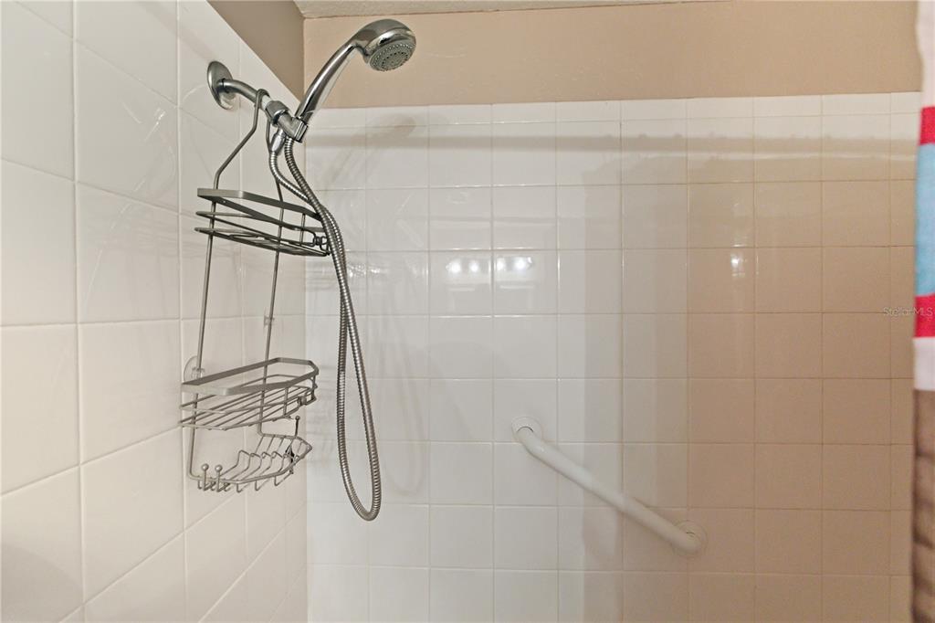 5122 Northridge Road, Unit 107 Sarasota, FL 34238 - Photo 19 of 36 a bathroom with a shower