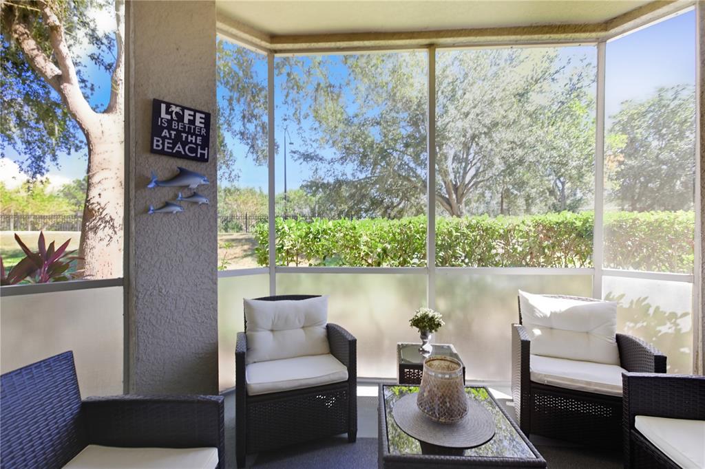 5122 Northridge Road, Unit 107 Sarasota, FL 34238 - Photo 27 of 36 a room with furniture and a large window