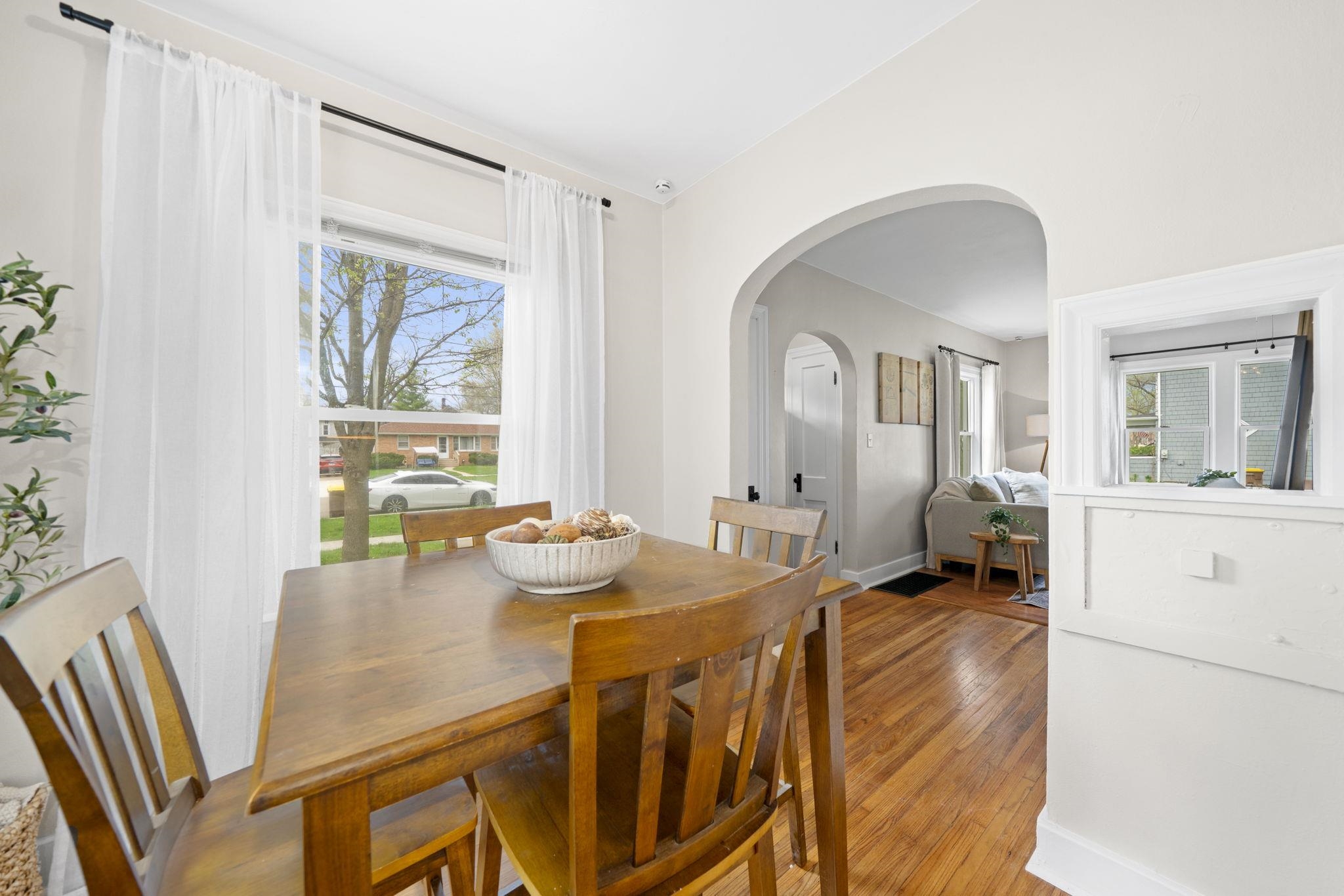 311 South 3rd Street Oregon, IL 61061 - Photo 11 of 24 a view of a dining room with furniture and a window