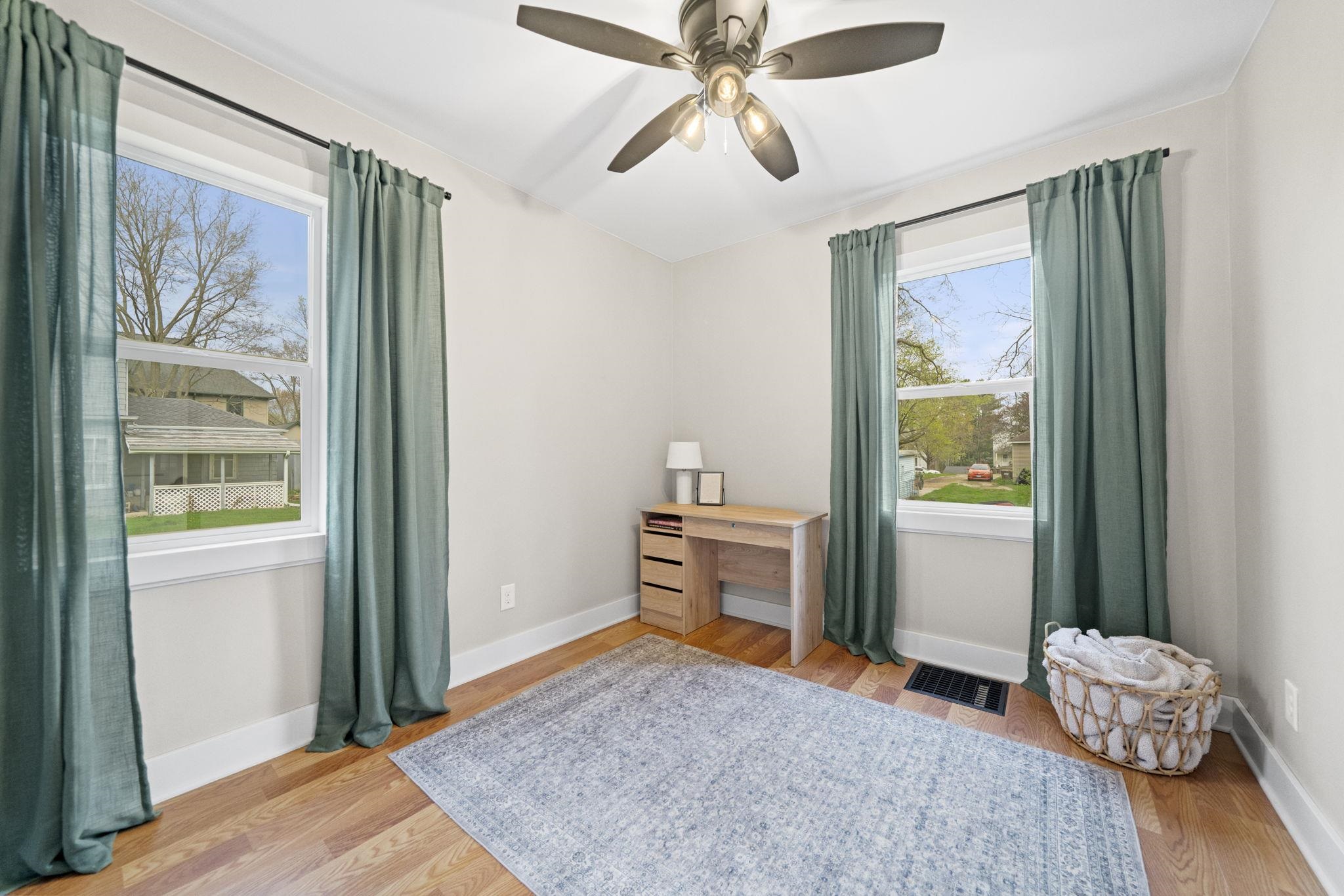 311 South 3rd Street Oregon, IL 61061 - Photo 16 of 24 a bedroom with a bed and a window