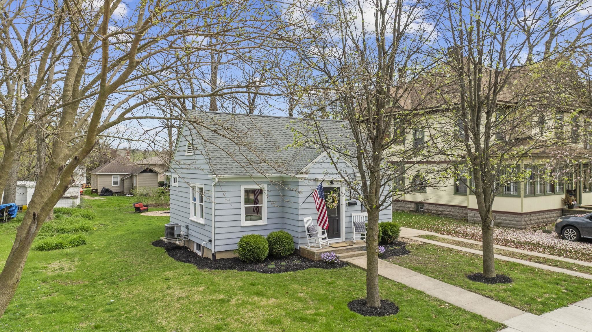 311 South 3rd Street Oregon, IL 61061 - Photo 19 of 24 a front view of a house with a yard