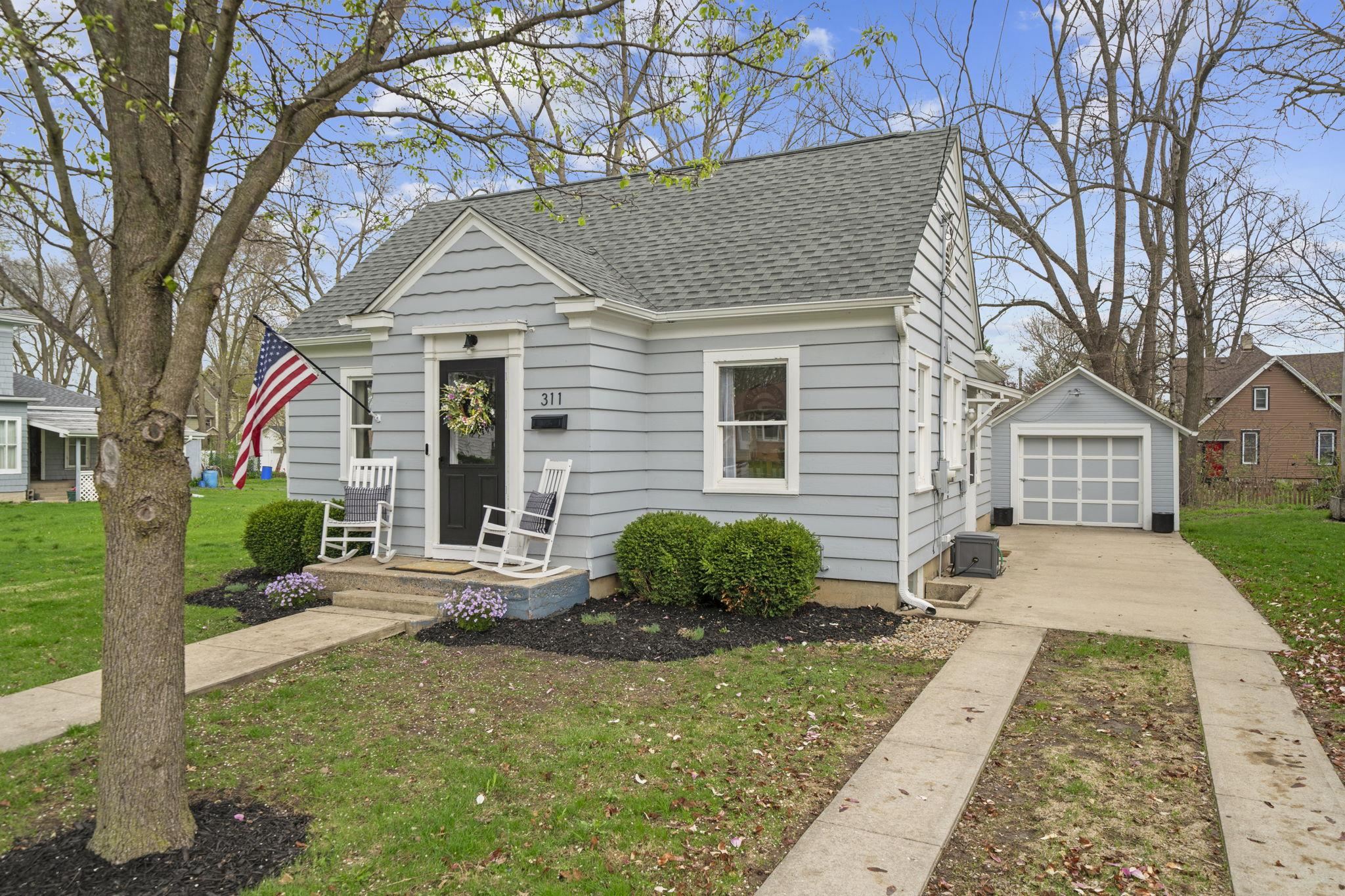 311 South 3rd Street Oregon, IL 61061 - Photo 21 of 24 a front view of a house with garden