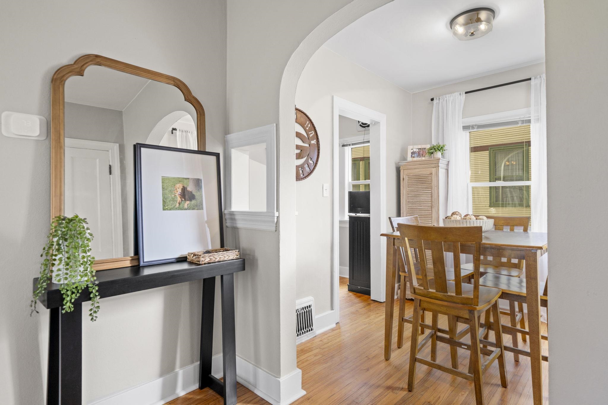 311 South 3rd Street Oregon, IL 61061 - Photo 4 of 24 a view of a dining room with furniture and a window