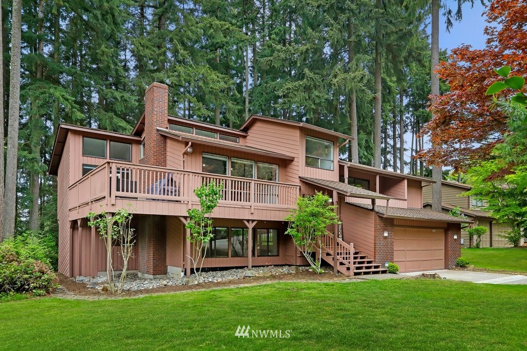 20830 28th Avenue Southeast Bothell, WA 98021 - Photo 1 of 40 front view of house with a yard
