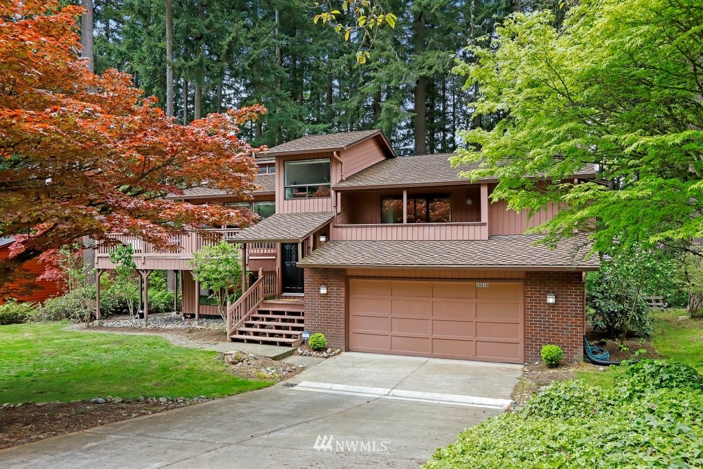 20830 28th Avenue Southeast Bothell, WA 98021 - Photo 2 of 40 front view of a house with a garage