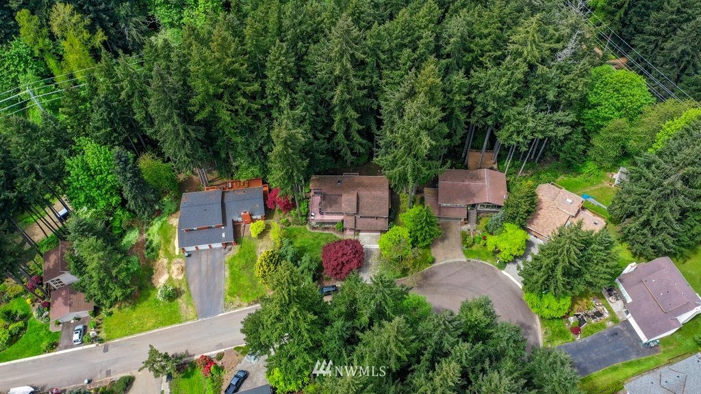 20830 28th Avenue Southeast Bothell, WA 98021 - Photo 39 of 40 an aerial view of a house with swimming pool and garden