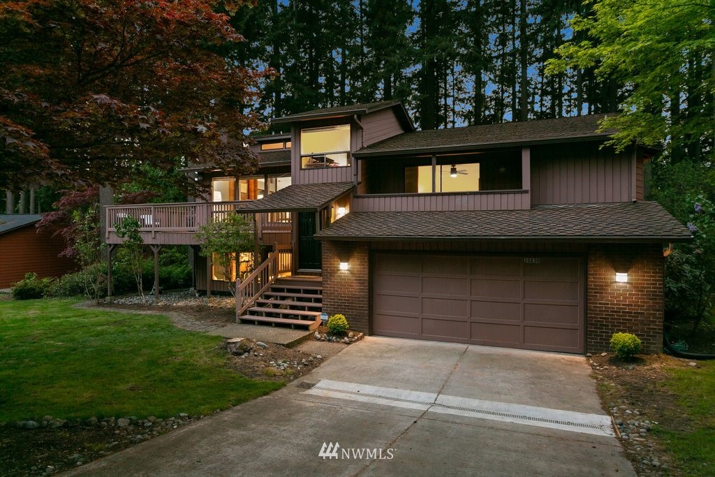 20830 28th Avenue Southeast Bothell, WA 98021 - Photo 40 of 40 a front view of a house with a yard