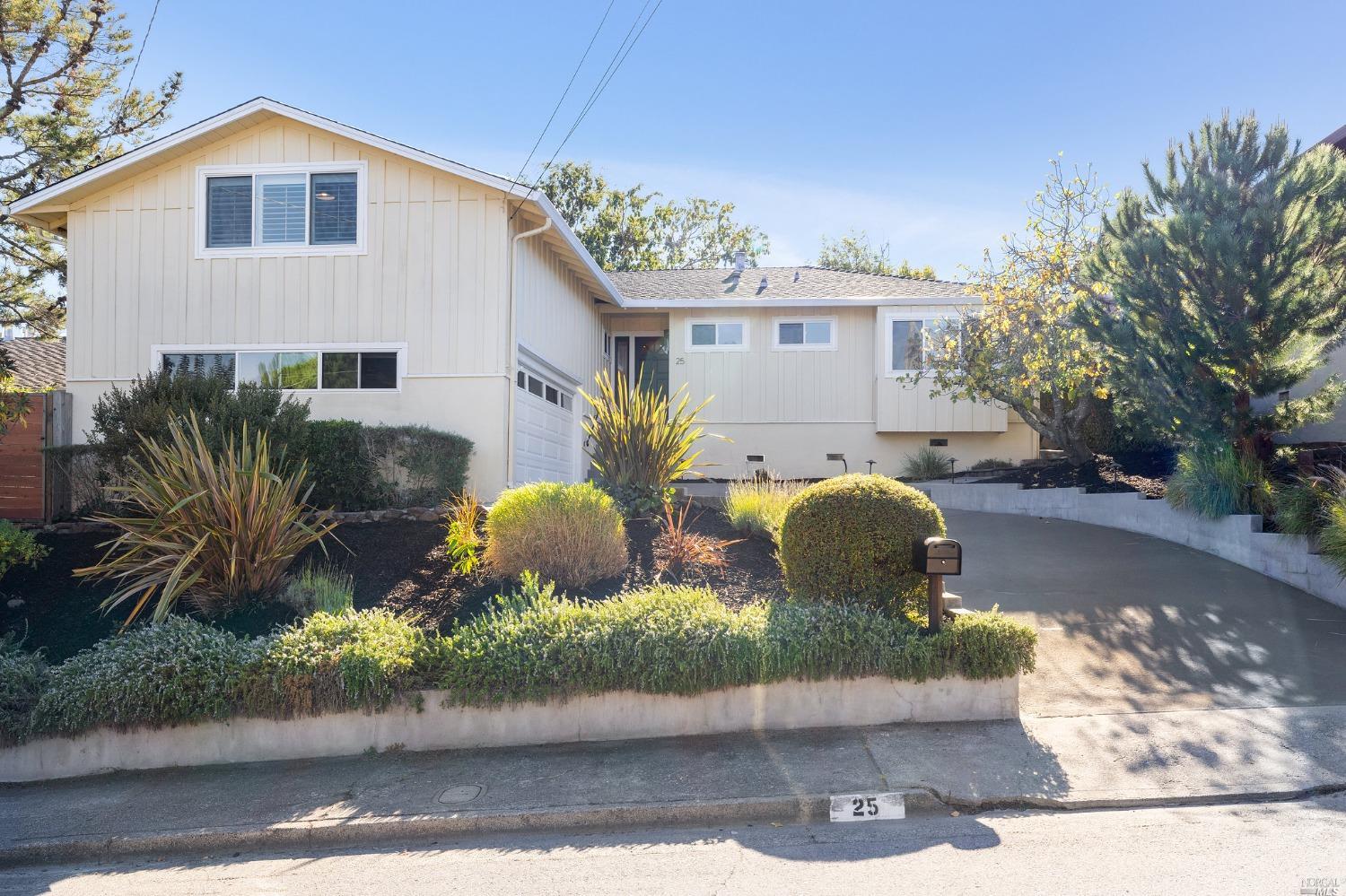 25 Ridgewood Drive San Rafael, CA 94901 - Photo 1 of 1 a front view of a house with garden