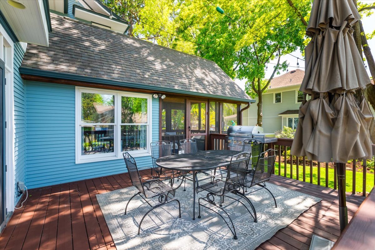 23 Columbia Street Naperville, IL 60540 - Photo 70 of 94 a view of a patio with a table chairs and backyard