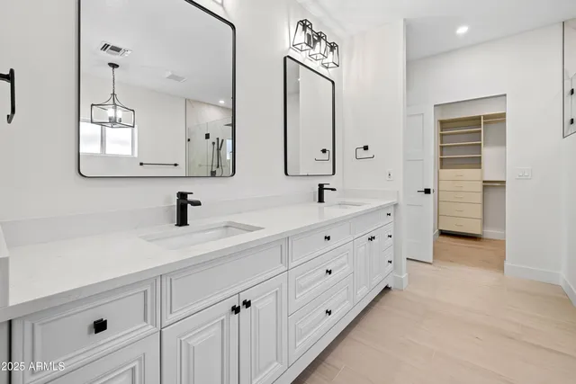a view of a livingroom with a ceiling fan and window