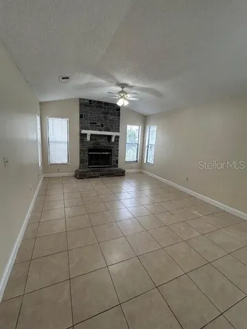 a view of a livingroom with a furniture