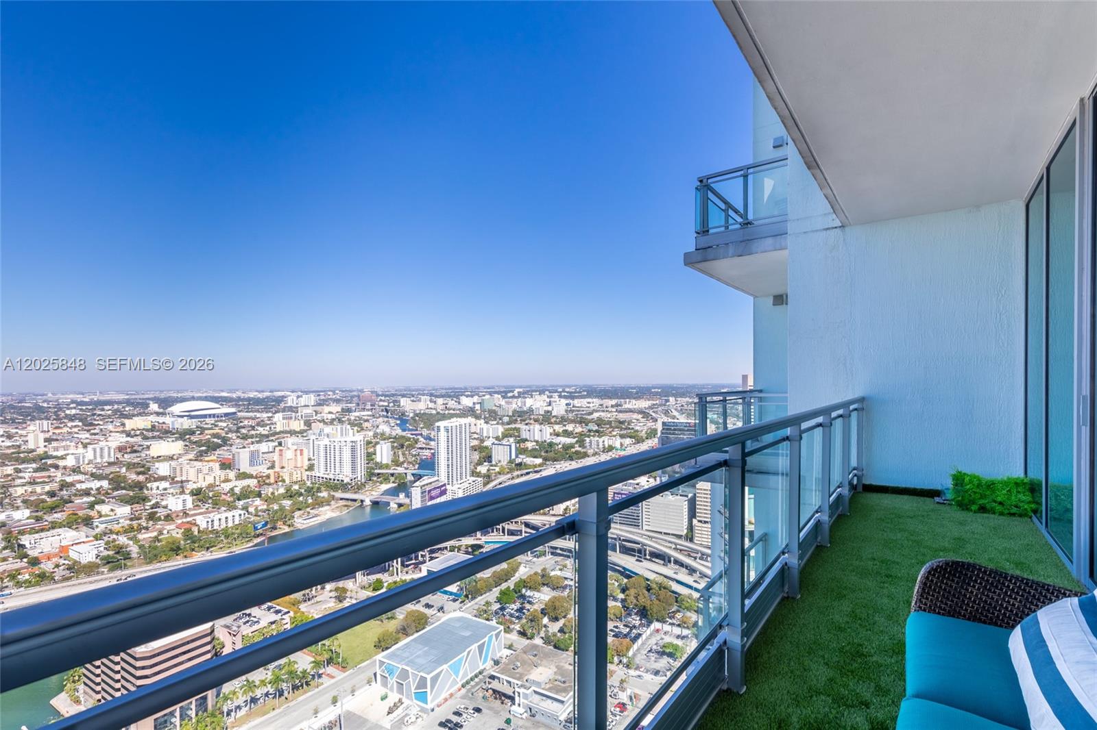 92 Southwest 3rd Street, Unit 5108 Miami, FL 33130 - Photo 21 of 33 a view of a balcony with chairs