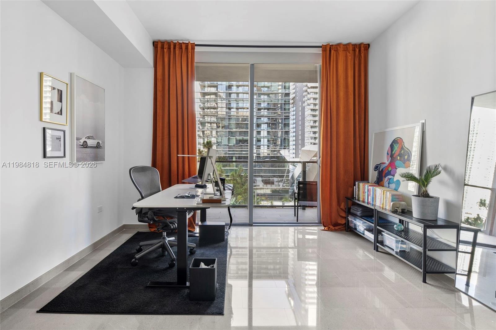 88 Southwest 7th Street, Unit 809 Miami, FL 33130 - Photo 19 of 39 a dining room with furniture and a window