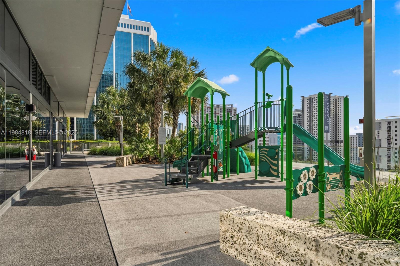 88 Southwest 7th Street, Unit 809 Miami, FL 33130 - Photo 34 of 39 a view of a street with potted plants