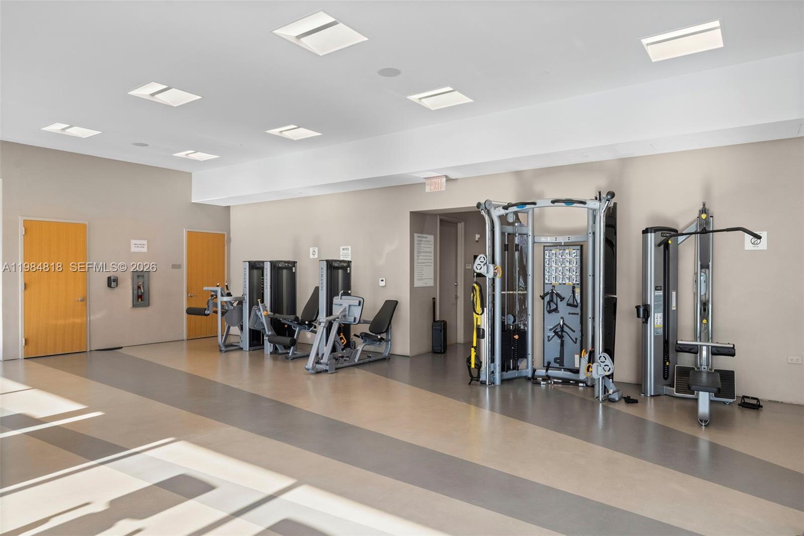 88 Southwest 7th Street, Unit 809 Miami, FL 33130 - Photo 36 of 39 a view of a room with gym equipment