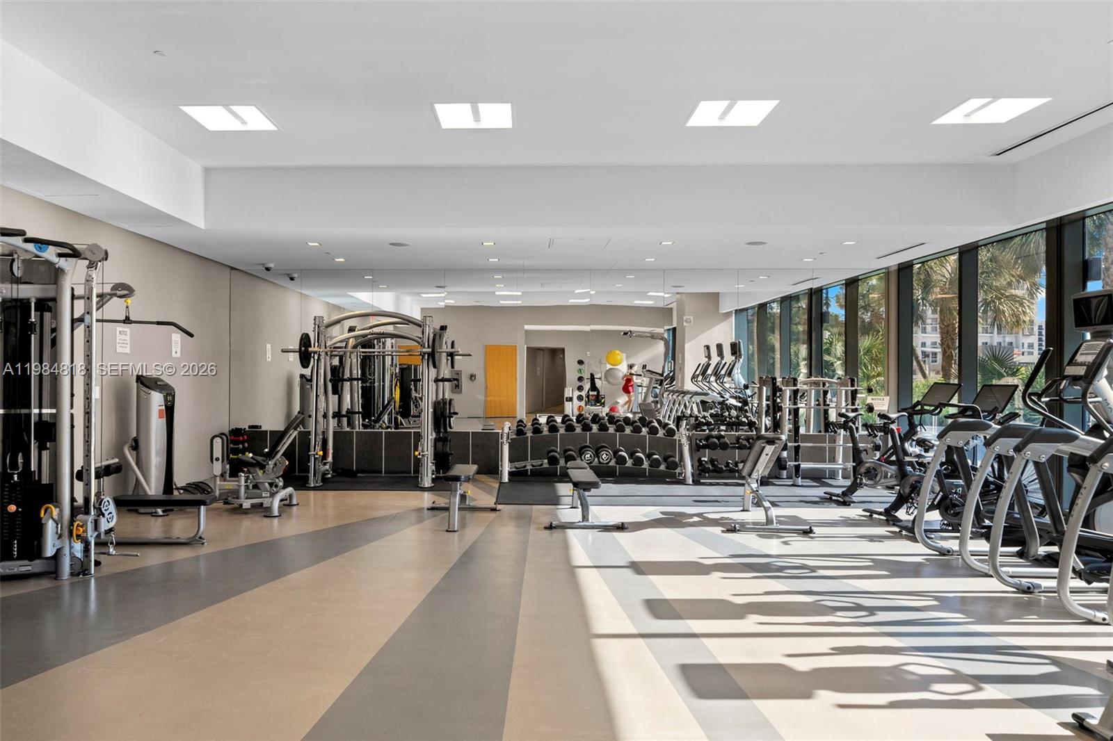 88 Southwest 7th Street, Unit 809 Miami, FL 33130 - Photo 37 of 39 a view of a room with gym equipment