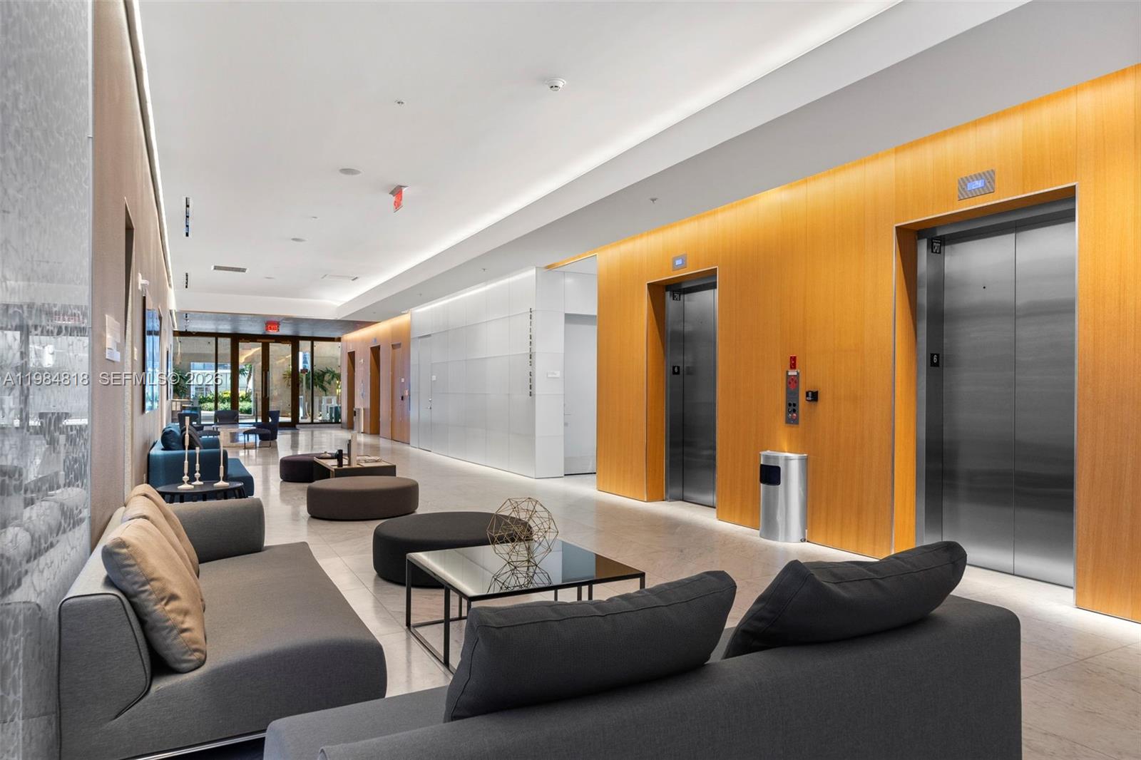 88 Southwest 7th Street, Unit 809 Miami, FL 33130 - Photo 39 of 39 a living room with furniture and a large window