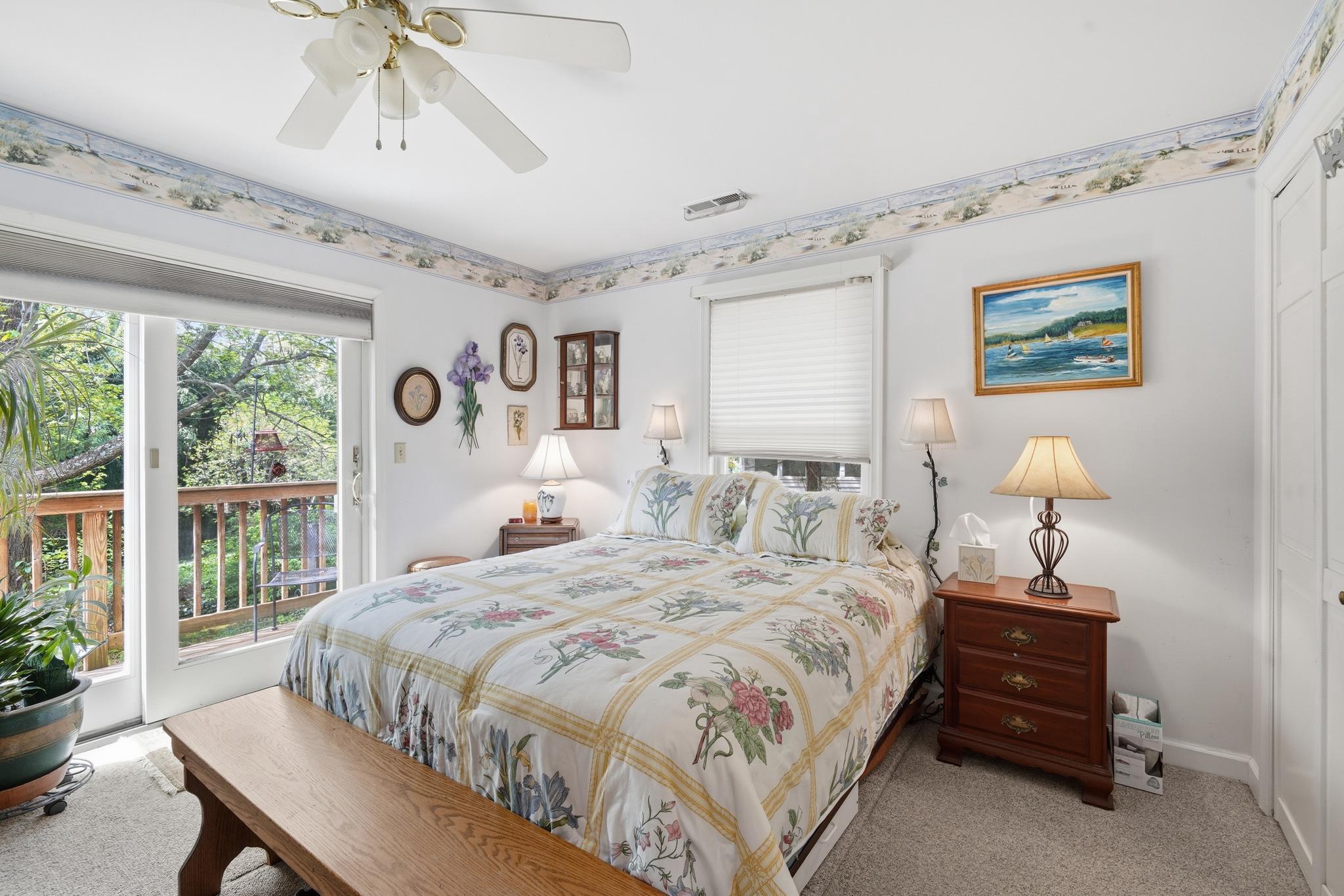 14136 Kentmore Park Road Kennedyville, MD 21645 - Photo 26 of 54 a bedroom with a bed and a window