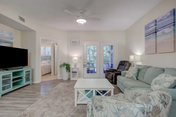a bathroom with a toilet sink and a shower