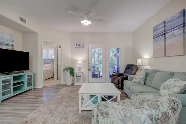 a bathroom with a toilet sink and a shower
