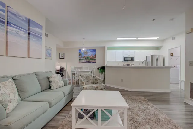 an aerial view of a house with a yard and garden