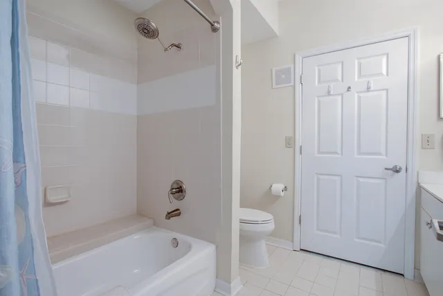 a kitchen with stainless steel appliances granite countertop a sink and a stove top oven