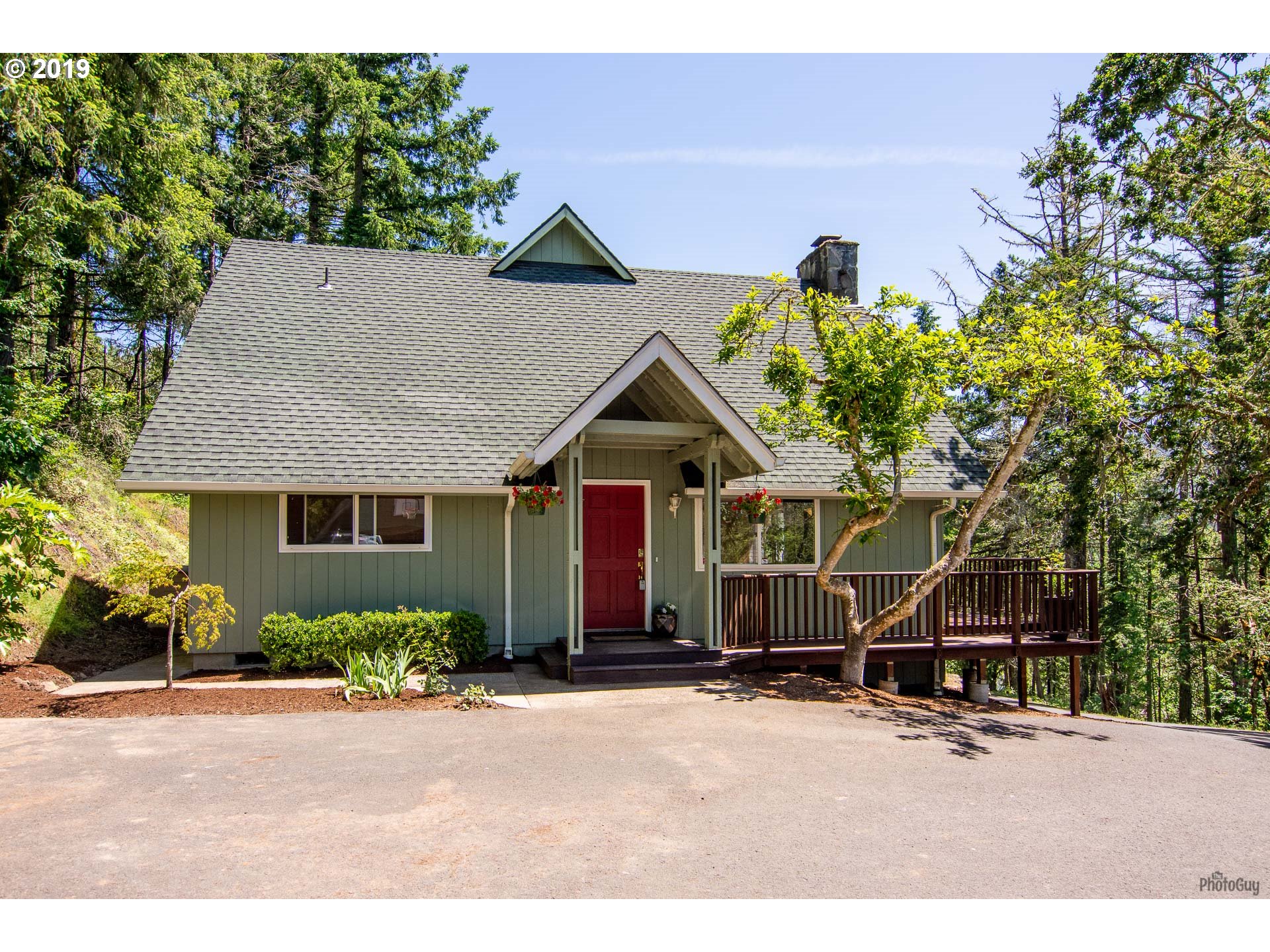 39639 Jasper Lowell Road Lowell, OR 97452 - Photo 2 of 32 a front view of a house with a yard