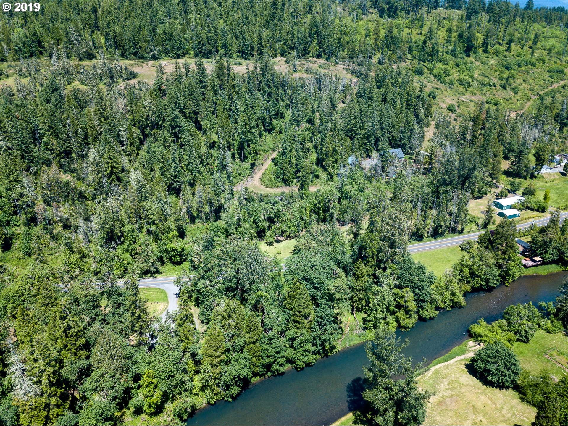 39639 Jasper Lowell Road Lowell, OR 97452 - Photo 27 of 32 a view of a garden with a house