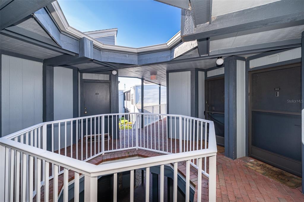 3916 Atrium Drive, Unit 4 Orlando, FL 32822 - Photo 1 of 71 a view of porch with furniture and wooden floor