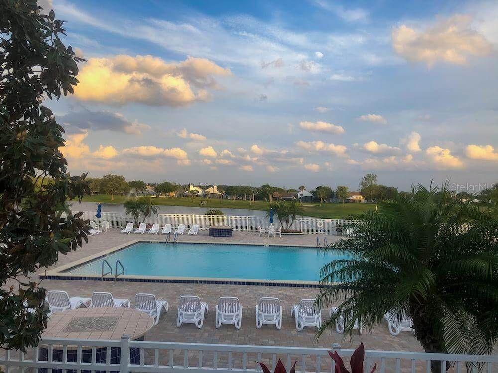 3916 Atrium Drive, Unit 4 Orlando, FL 32822 - Photo 36 of 71 an aerial view of a house with a yard