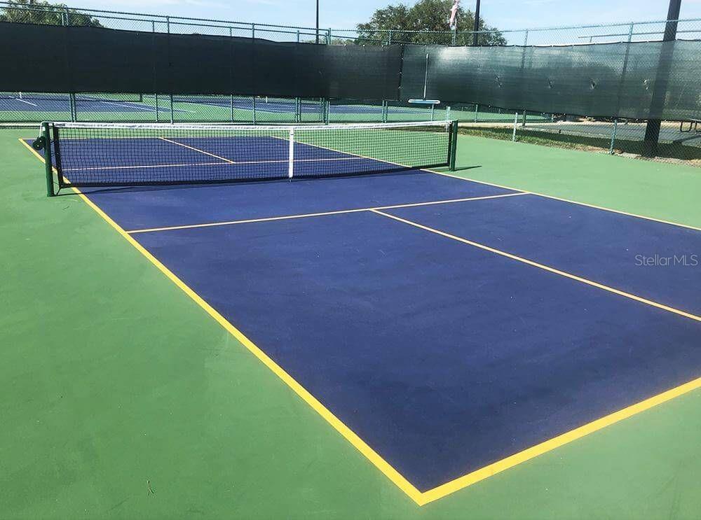 3916 Atrium Drive, Unit 4 Orlando, FL 32822 - Photo 40 of 71 a view of a tennis court