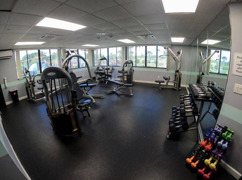 3916 Atrium Drive, Unit 4 Orlando, FL 32822 - Photo 51 of 71 a view of a room with gym equipment