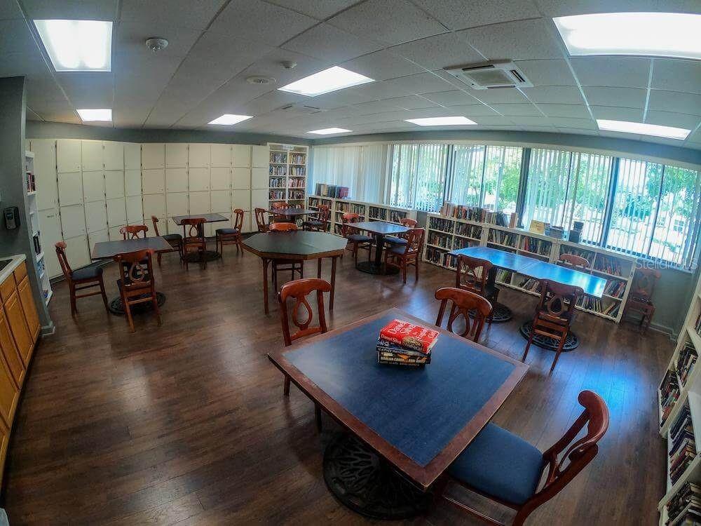 3916 Atrium Drive, Unit 4 Orlando, FL 32822 - Photo 52 of 71 a room with lots of furniture and view of dining room