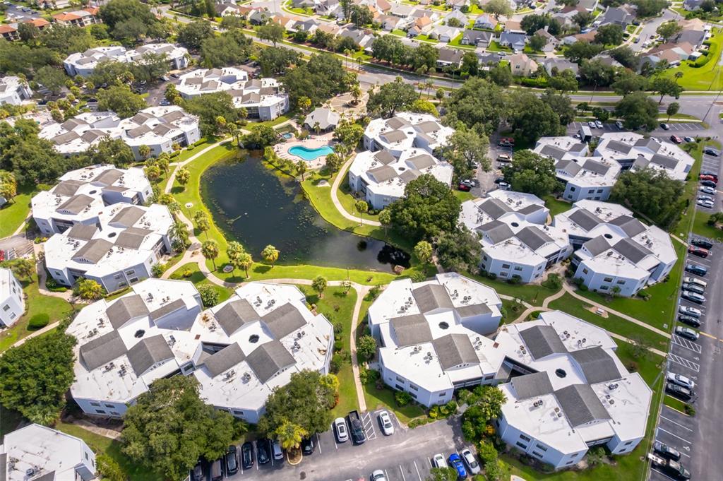 3916 Atrium Drive, Unit 4 Orlando, FL 32822 - Photo 66 of 71 an aerial view of residential house with outdoor space and parking