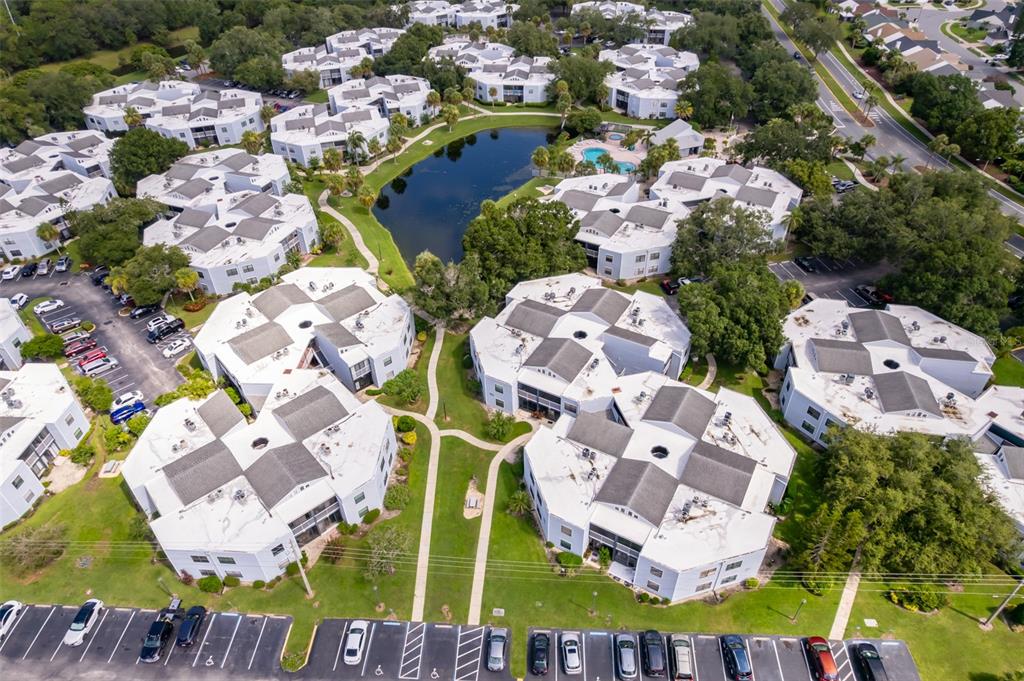 3916 Atrium Drive, Unit 4 Orlando, FL 32822 - Photo 67 of 71 an aerial view of residential houses with outdoor space