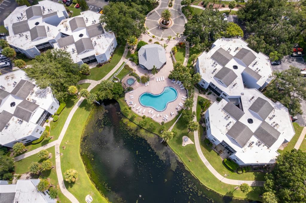 3916 Atrium Drive, Unit 4 Orlando, FL 32822 - Photo 69 of 71 an aerial view of a swimming pool
