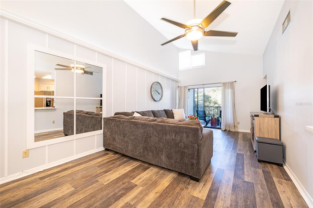 3916 Atrium Drive, Unit 4 Orlando, FL 32822 - Photo 10 of 71 a living room with furniture and a window