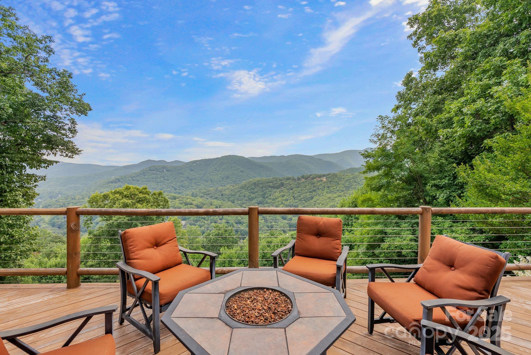 an outdoor living room with furniture