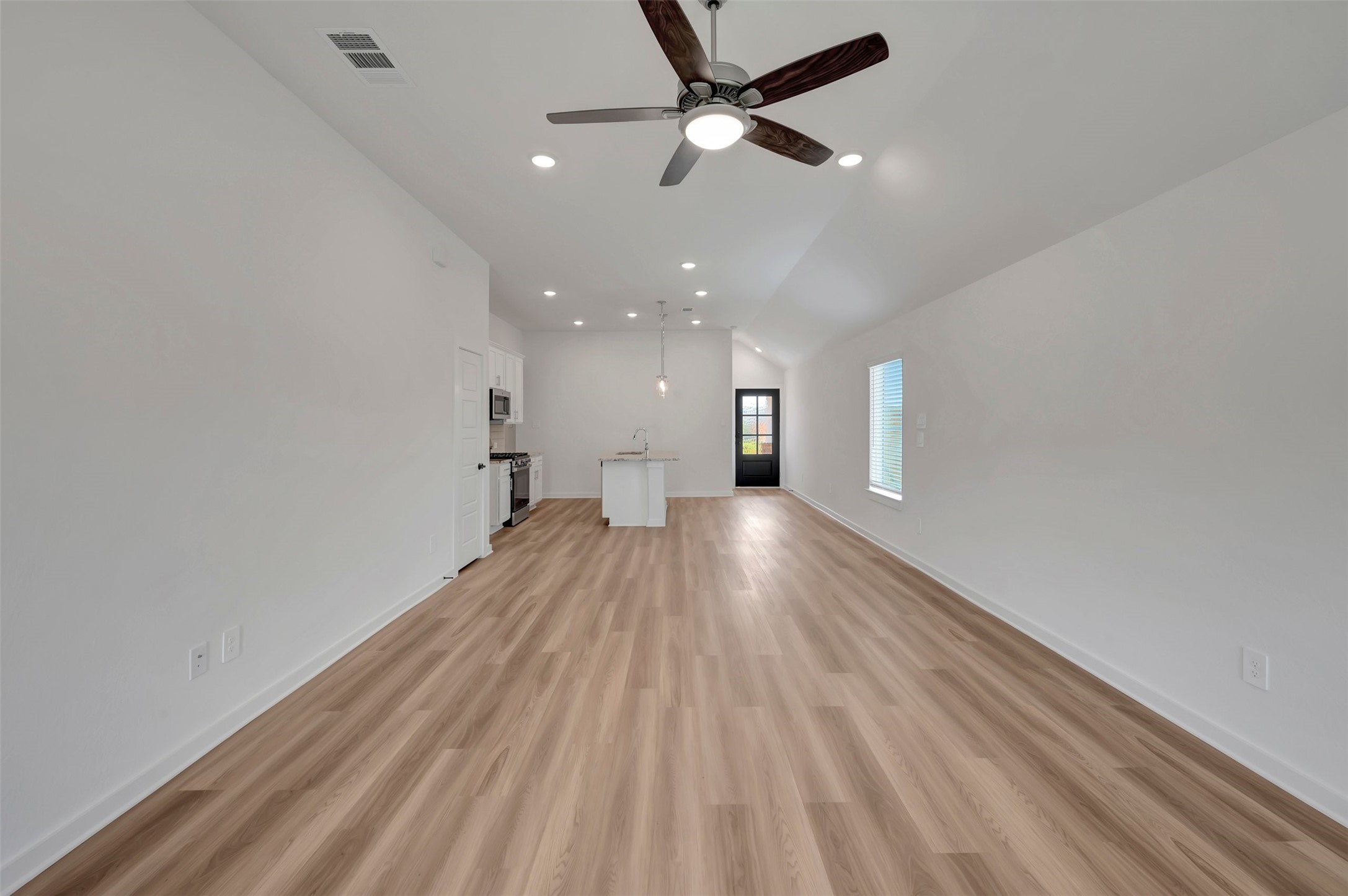 759 Hackberry Branch Magnolia, TX 77354 - Photo 23 of 43 wooden floor in an empty room with a window