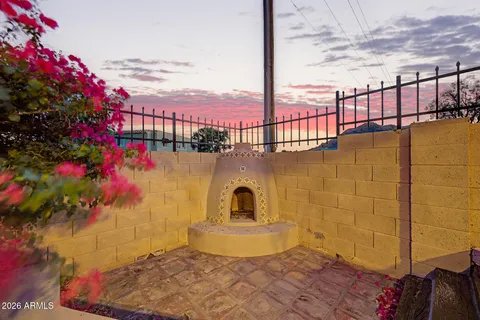 a view of a terrace with a flower garden