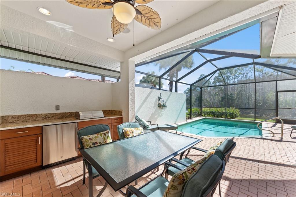 10205 Cape Roman Road Bonita Springs, FL 34135 - Photo 20 of 31 a view of a livingroom with furniture and window