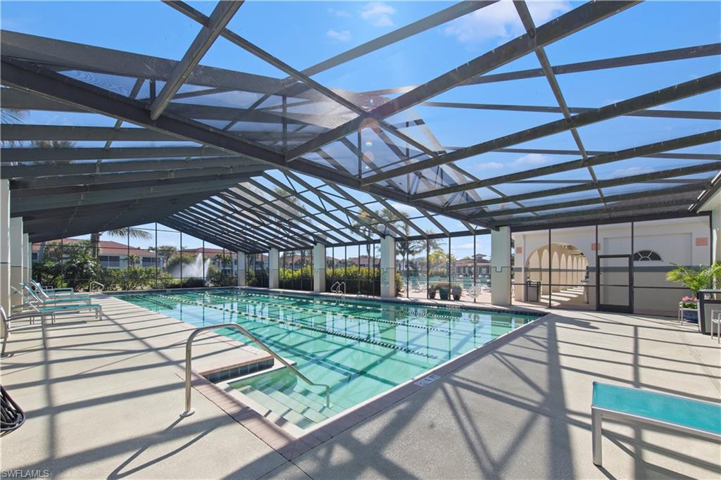 10205 Cape Roman Road Bonita Springs, FL 34135 - Photo 23 of 31 a view of a backyard with a wooden deck