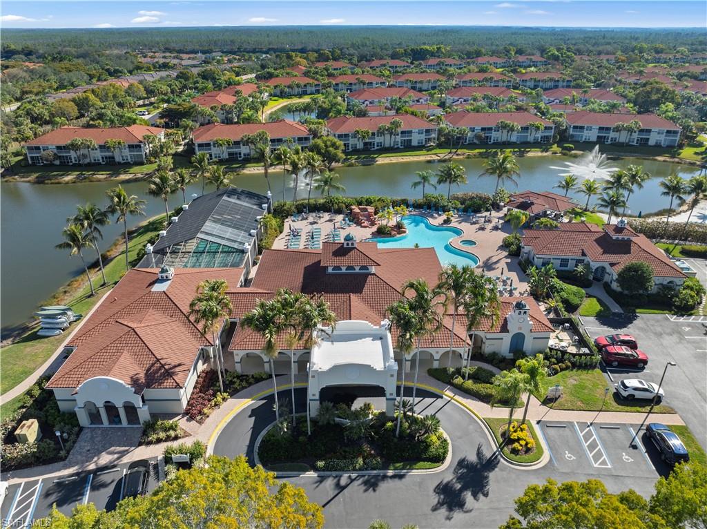 10205 Cape Roman Road Bonita Springs, FL 34135 - Photo 26 of 31 an aerial view of a house with a lake view