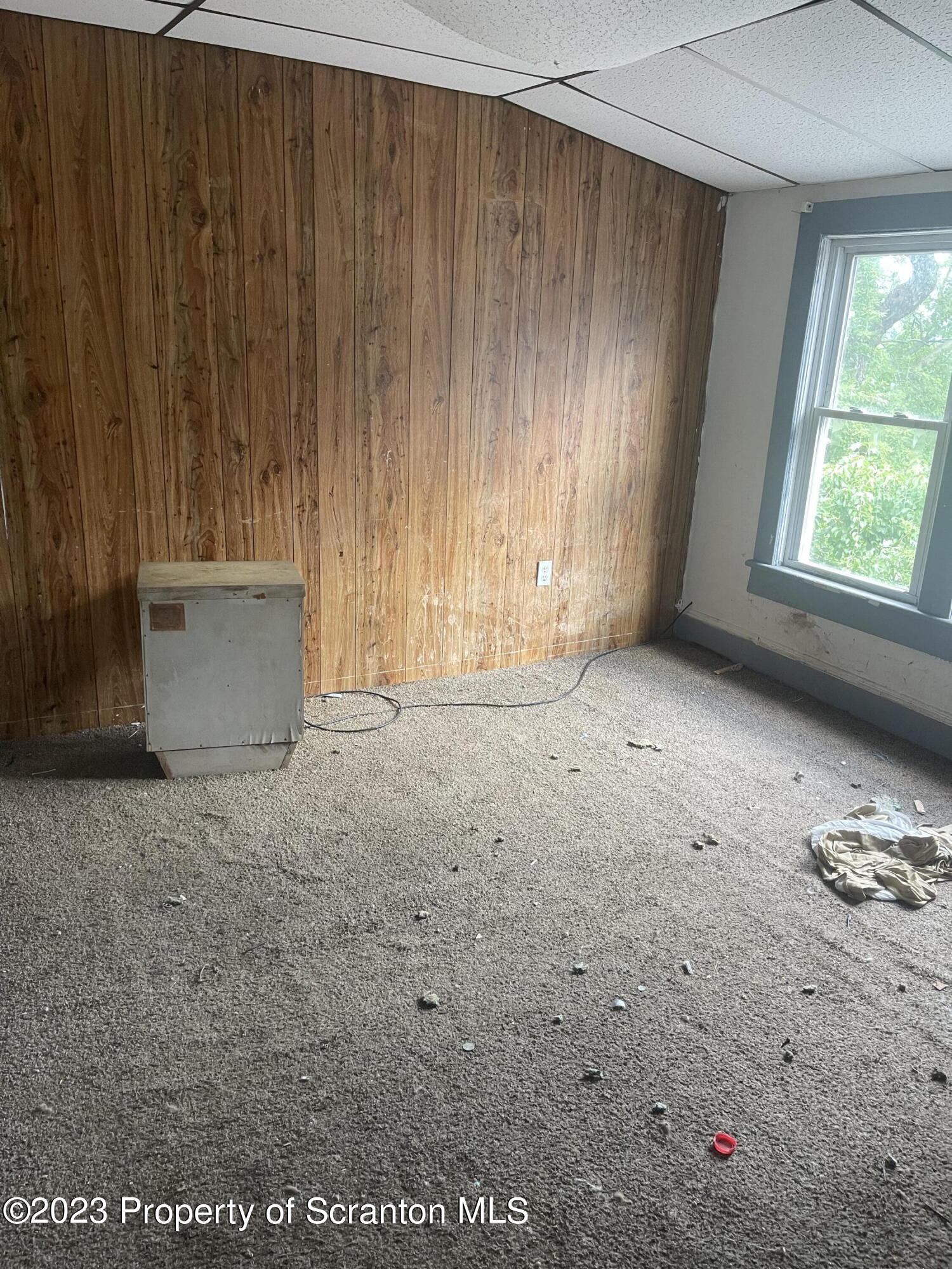 831 Monroe Avenue Scranton, PA 18510 - Photo 15 of 35 an empty room with windows