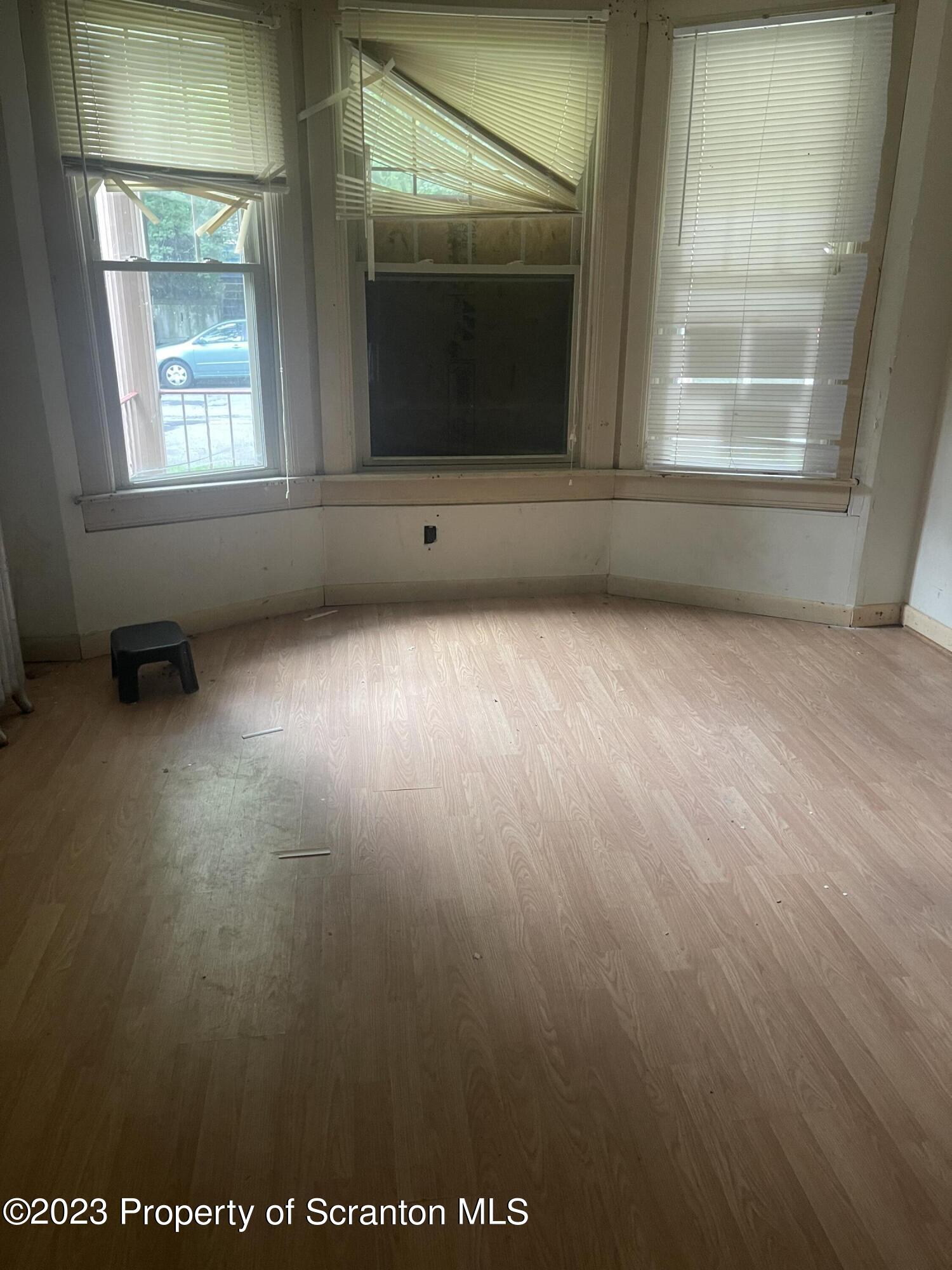 831 Monroe Avenue Scranton, PA 18510 - Photo 25 of 35 an empty room with a window