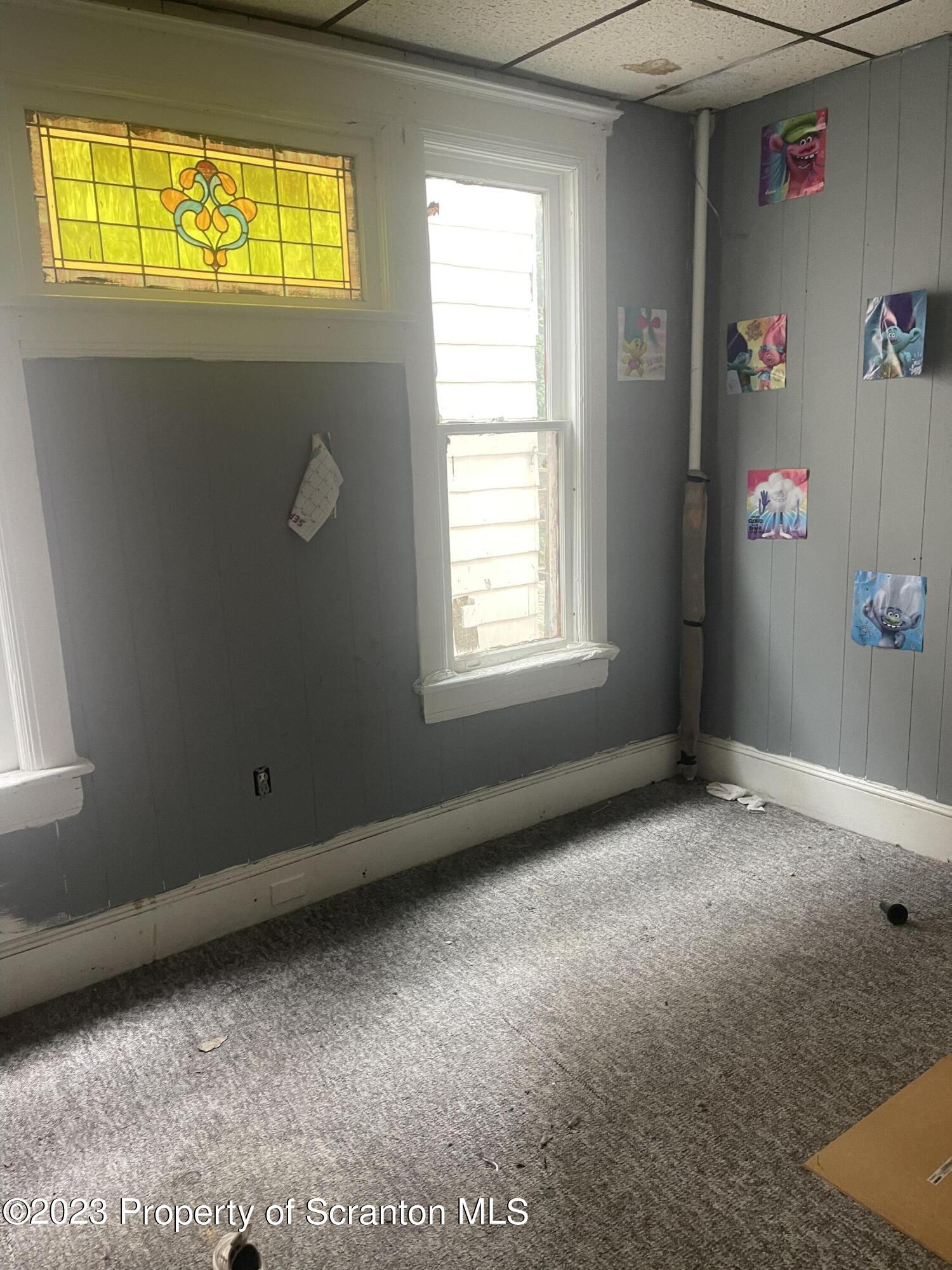 831 Monroe Avenue Scranton, PA 18510 - Photo 29 of 35 a view of an empty room with a window