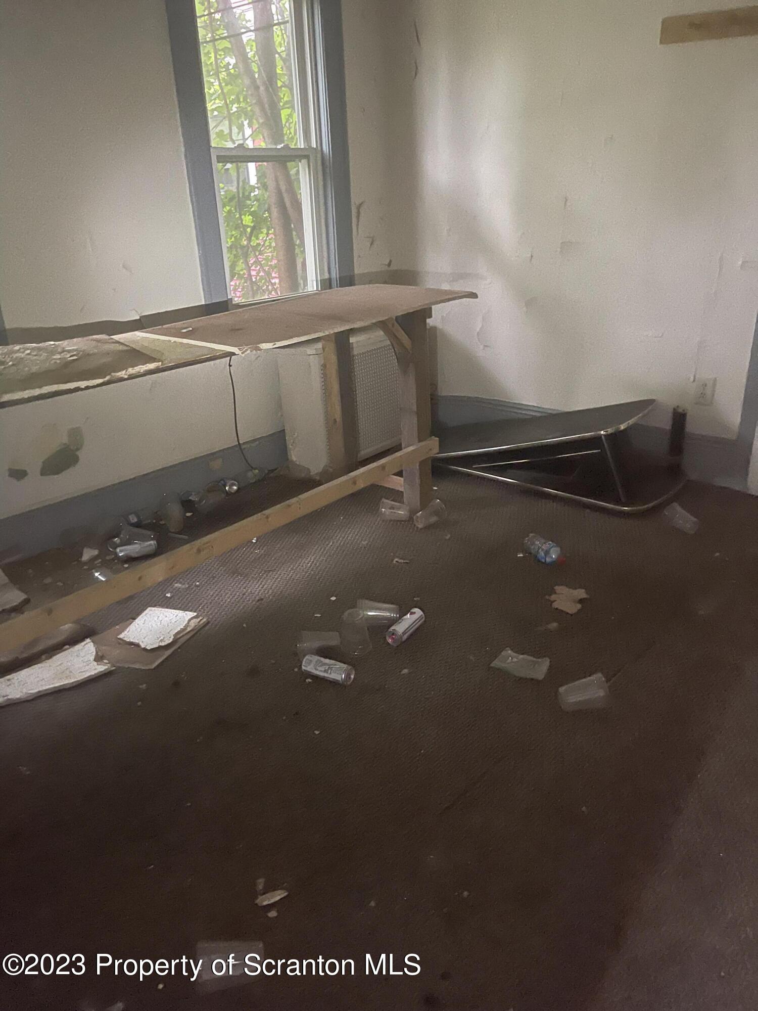 831 Monroe Avenue Scranton, PA 18510 - Photo 34 of 35 a view of an empty room with a window