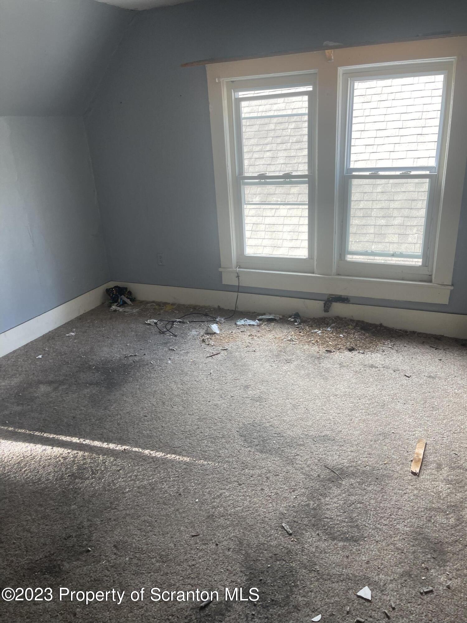831 Monroe Avenue Scranton, PA 18510 - Photo 5 of 35 a view of a room with an empty space