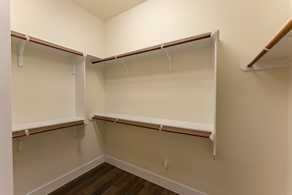 13008 Armaga Springs Road Austin, TX 78727 - Photo 19 of 33 Walk in closet with wood tiled floors