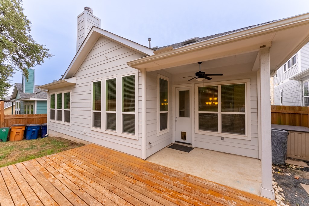 13008 Armaga Springs Road Austin, TX 78727 - Photo 29 of 33 Deck with a patio and a ceiling fan